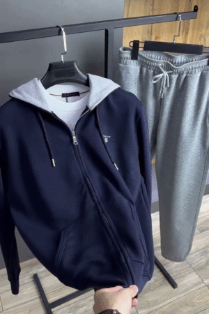 Cotton Hoodie in navy with matching gray sweatpants.