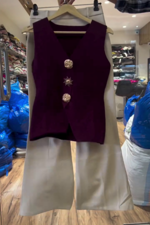 sleeveless vest and wide-leg pant outfit.